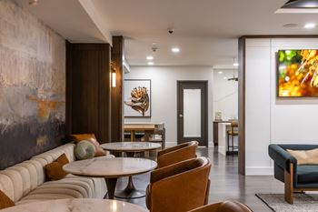 Community lounge with modern furniture and artwork